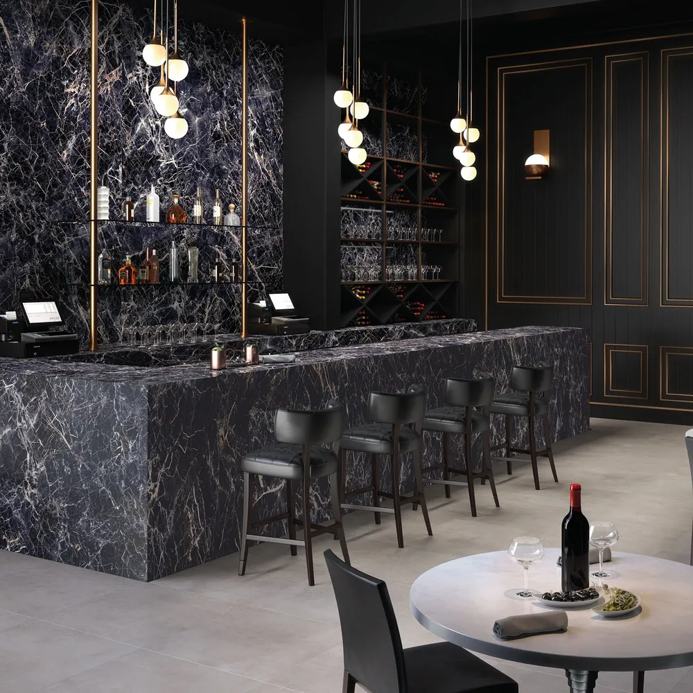 Onyx Galaxy Daltile quartz / porcelain waterfall edge