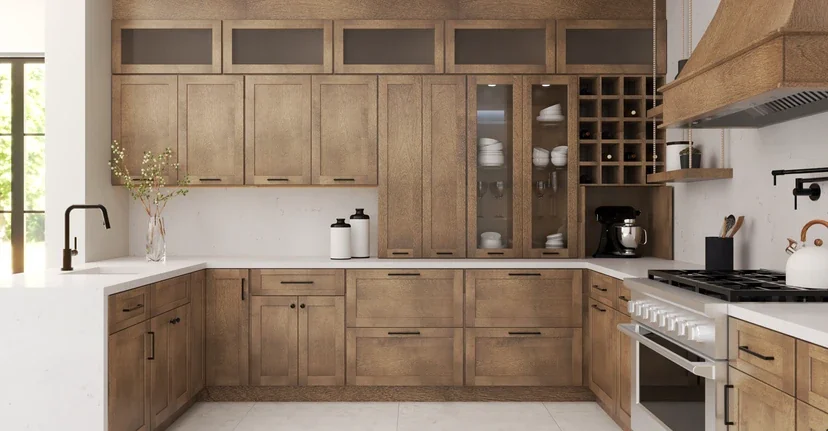 White shaker kitchen cabinets in Palm Beach County with marble countertops and stainless appliances