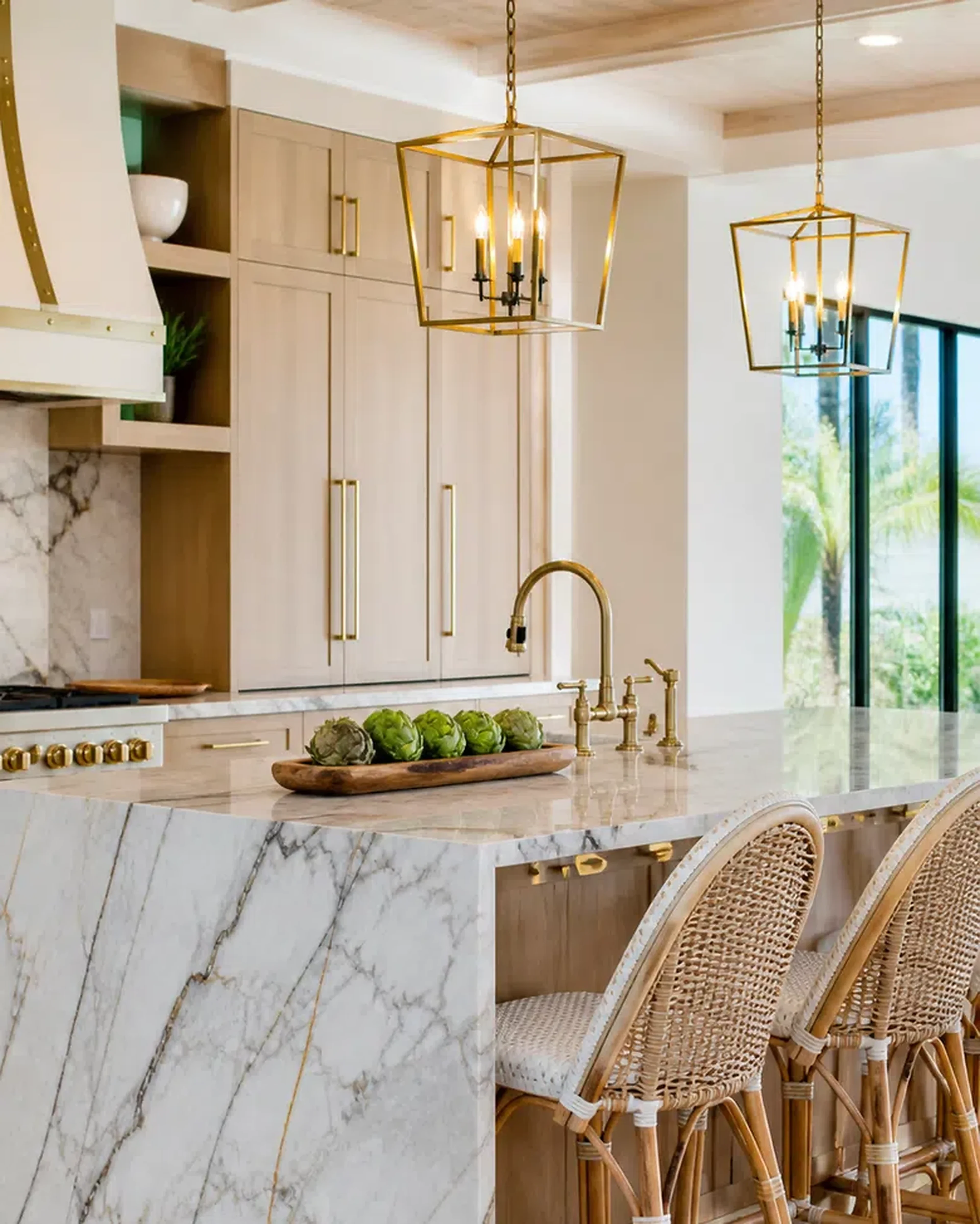 Luxury Delray Beach kitchen material inspiration with marble-look counters and designer lighting