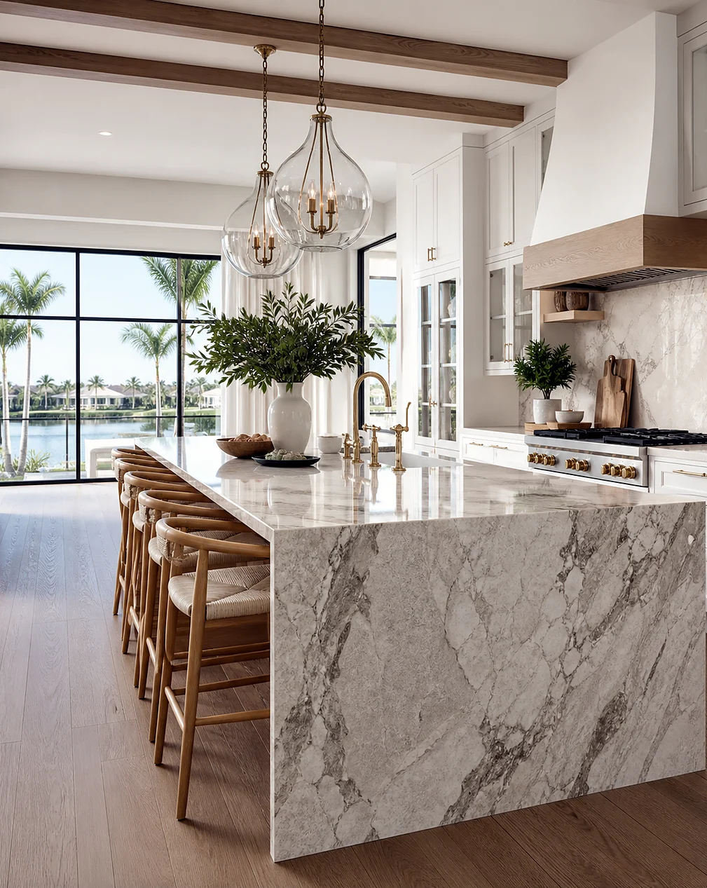 Modern Juno Beach kitchen remodel with waterfall island and coordinated cabinet finishes