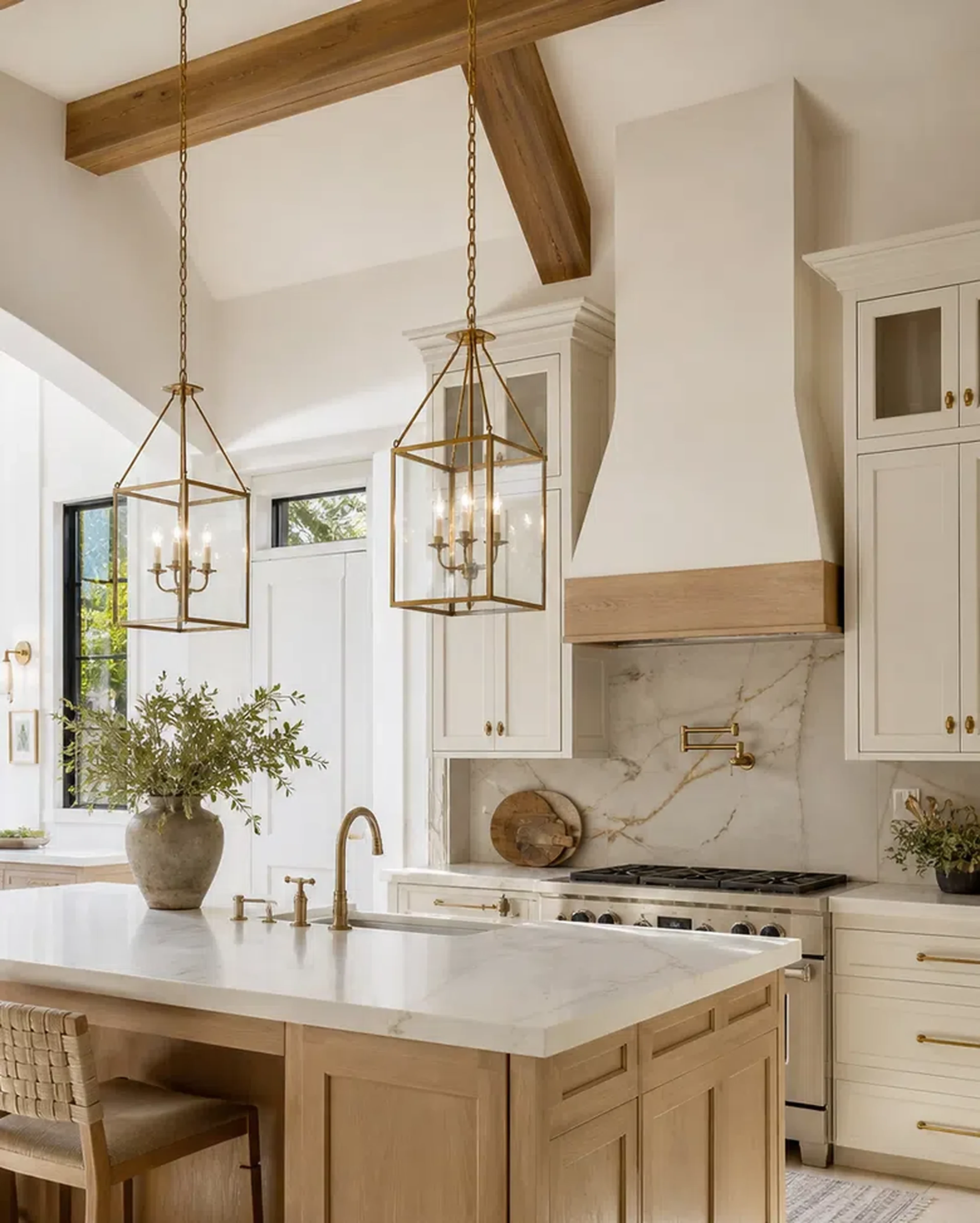 Luxury Palm Beach Gardens kitchen material inspiration with marble-look counters and designer lighting