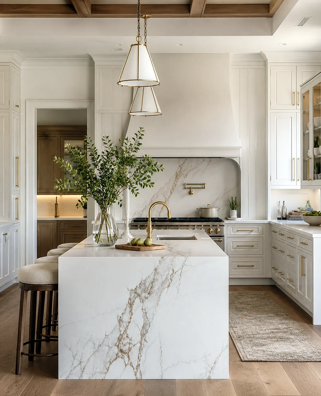 Modern Palm Springs kitchen remodel with waterfall island and coordinated cabinet finishes